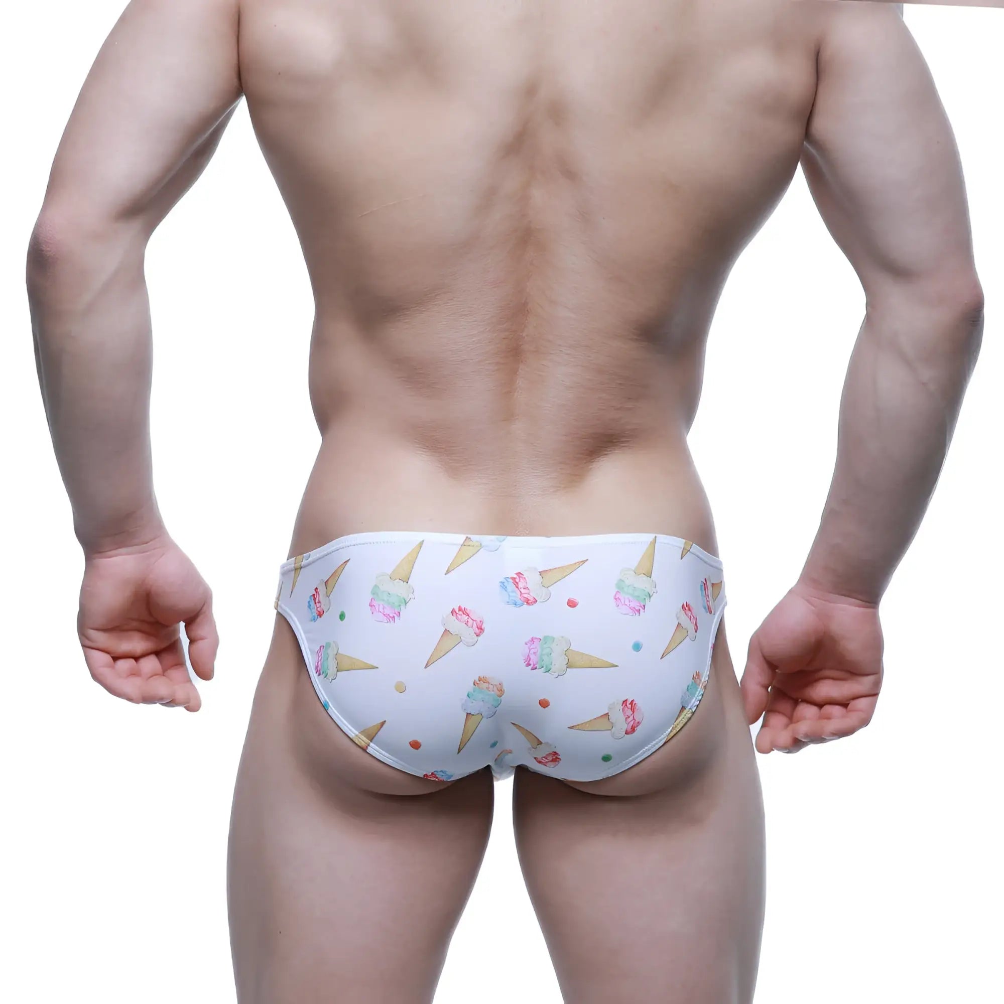 White swim trunks by MetroMaleWear featuring colorful ice cream cone and sprinkle pattern gelato design