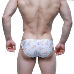 White swim trunks by MetroMaleWear featuring colorful ice cream cone and sprinkle pattern gelato design