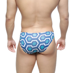 MetroMaleWear super lowrise bikini swim trunks in blue and white with a retro honeycomb geometric pattern