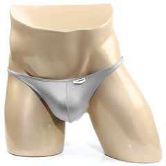 MetroMaleWear TROZO bikini silver metallic thong with small rectangular brand tag on the front