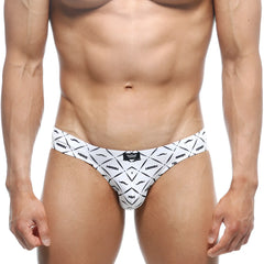 White men’s briefs with bold black geometric pattern and stylized mustache motifs by naninen metro male wear