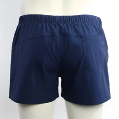 Navy blue MetroMaleWear Viena athletic shorts with elastic waistband and single back pocket shown from the back side