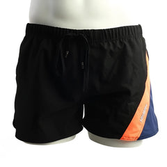 Black swim trunks with bold orange and blue diagonal stripe and elastic waistband with drawstrings metroMalewear viena short 4715-22