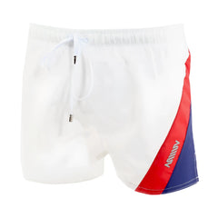 White swim trunks metro male wear viena short with bold red and blue diagonal stripe and milly logo on the side