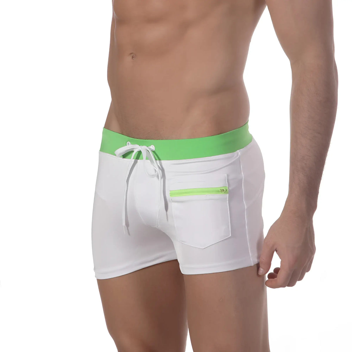 White swim trunks with bright green waistband and matching zipper pocket by metromalewear for swimming and beachwear