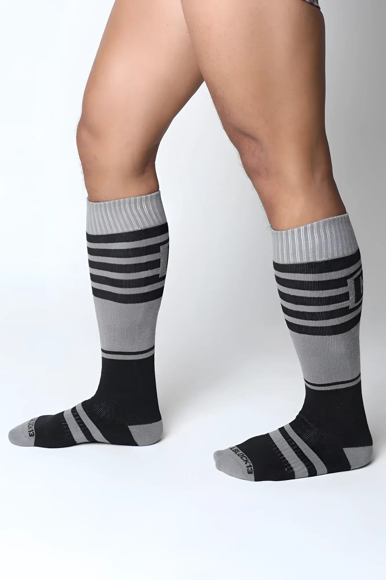 Black and gray striped midfield knee high socks with ribbed cuff in soft breathable fabric for everyday wear