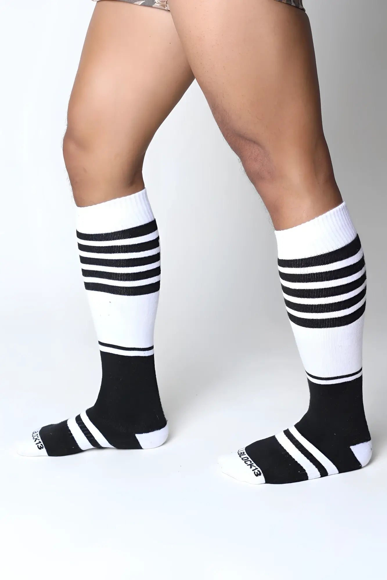 Black and white striped midfield knee high socks with ribbed texture in soft breathable fabric for everyday wear