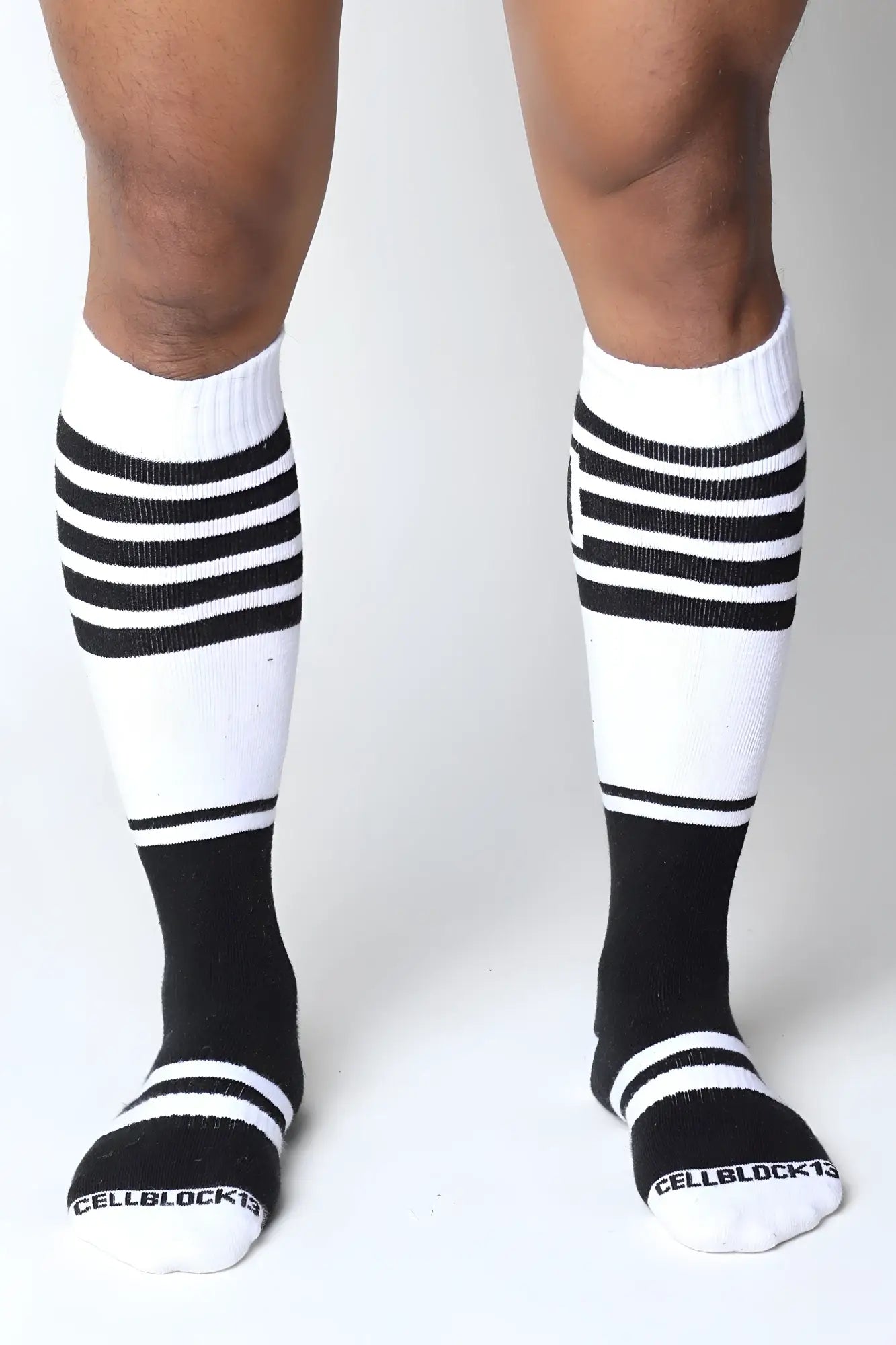 Midfield knee high black and white striped ribbed socks with cellblock brand name on toe in 7 colors