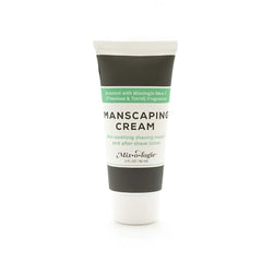 White tube of Mixologie manscaping cream shave lotion with minimalist black and green label for grooming use
