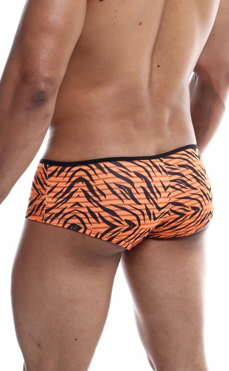 Mob boyshort orange tiger-striped swim trunks with black accents designed for comfortable swimwear use