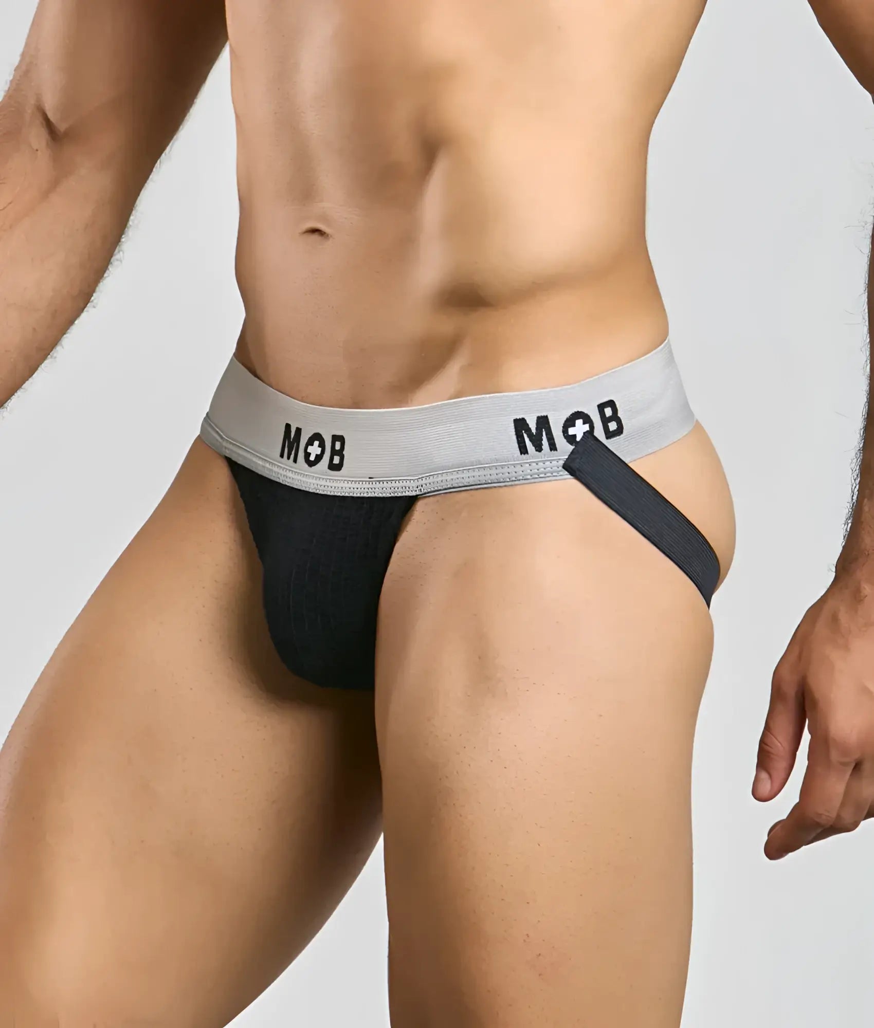 Black mob classic jock 3 inches briefs with gray waistband logo and black side strap shown from the back side