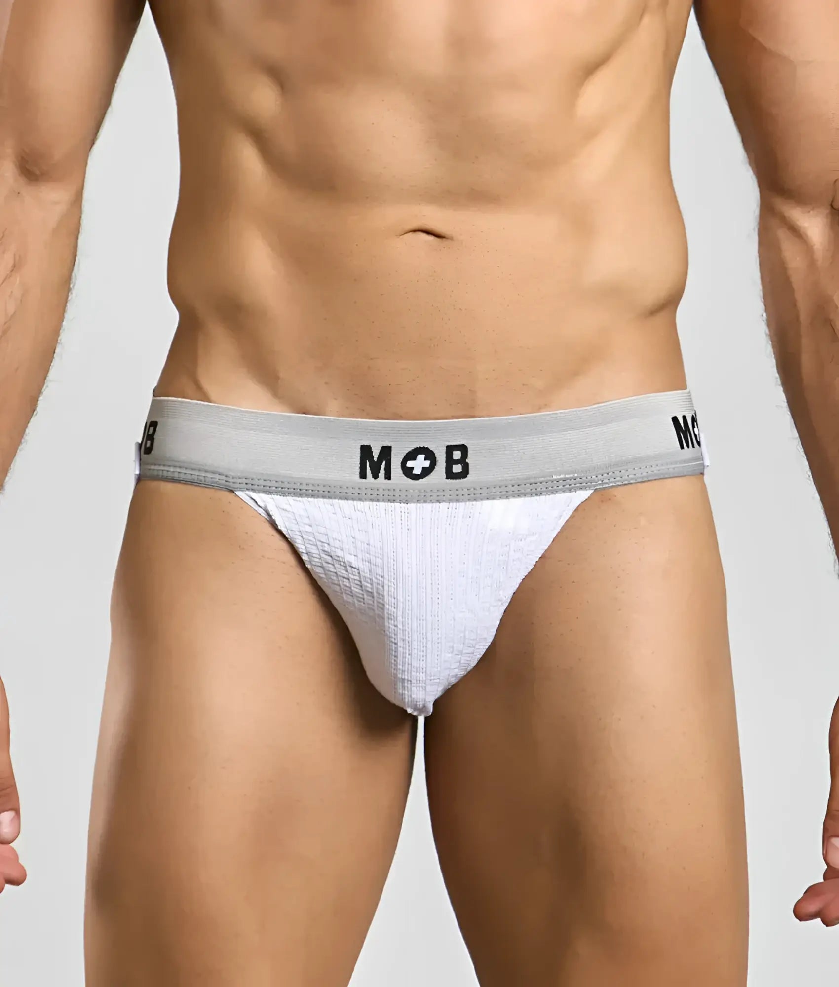 White textured briefs with a gray waistband featuring the mob logo from the mob classic jock 3 inches collection
