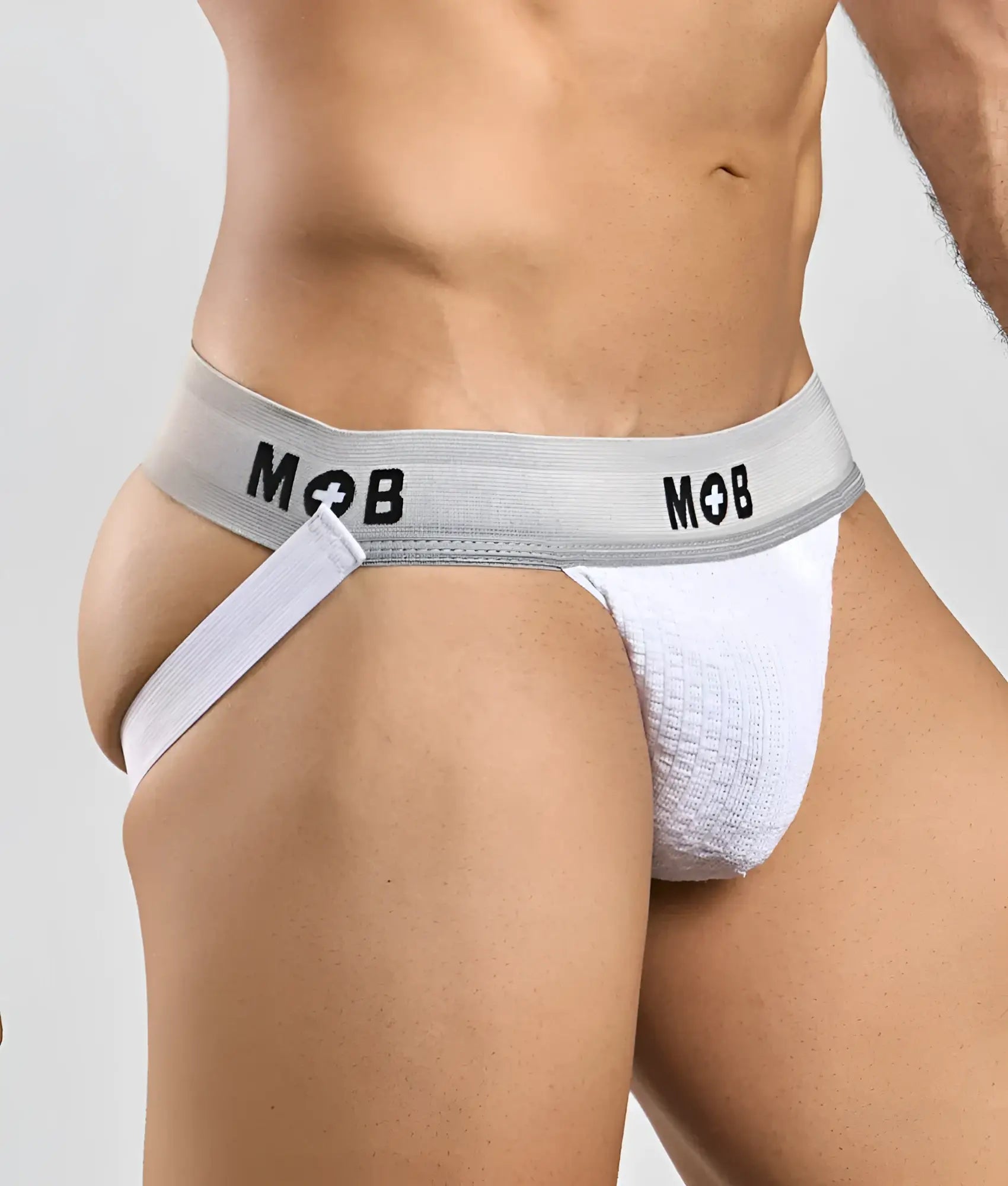 White textured jockstrap with gray elastic waistband and black mob branding from mob classic jock 3 inches collection