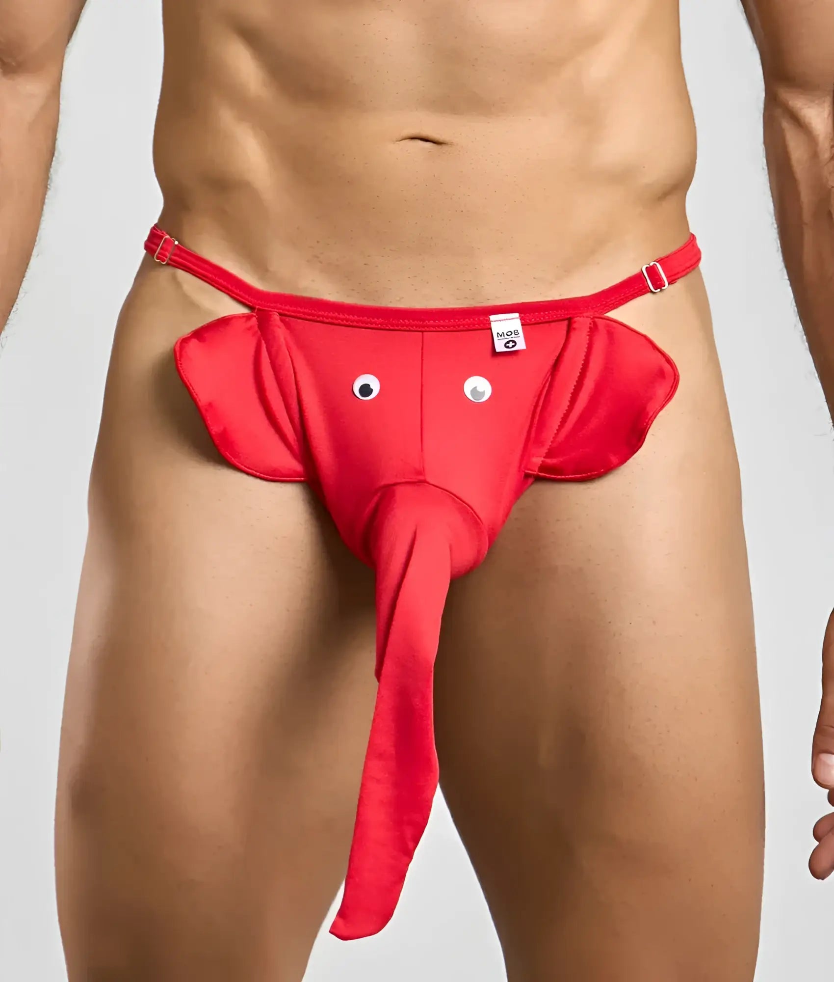 Red elephant-themed thong with googly eyes and a long trunk made of stretchy fabric showing front side details