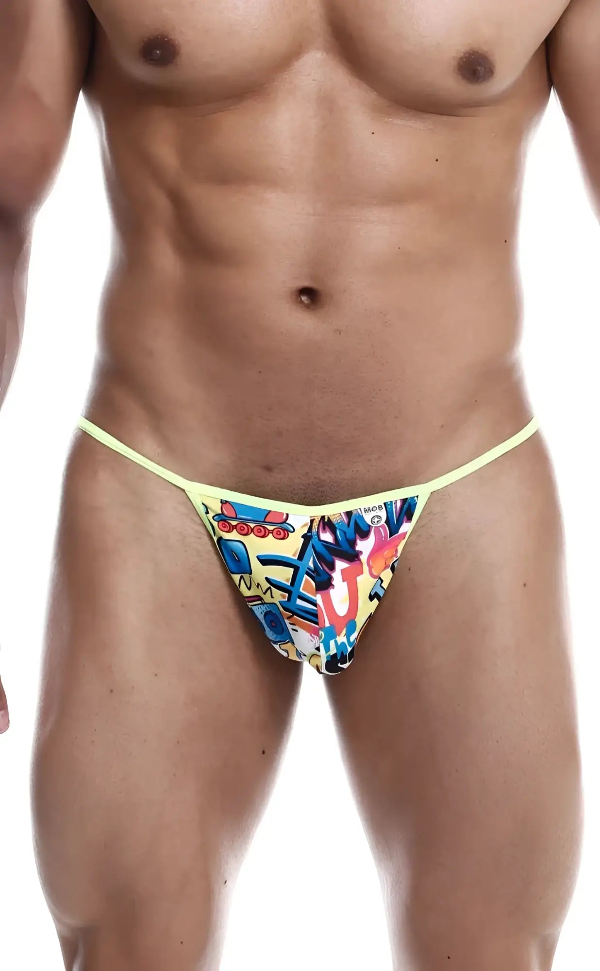 Bright yellow mob hipster t thong featuring vibrant graffiti print with colorful cartoon characters and bold lettering