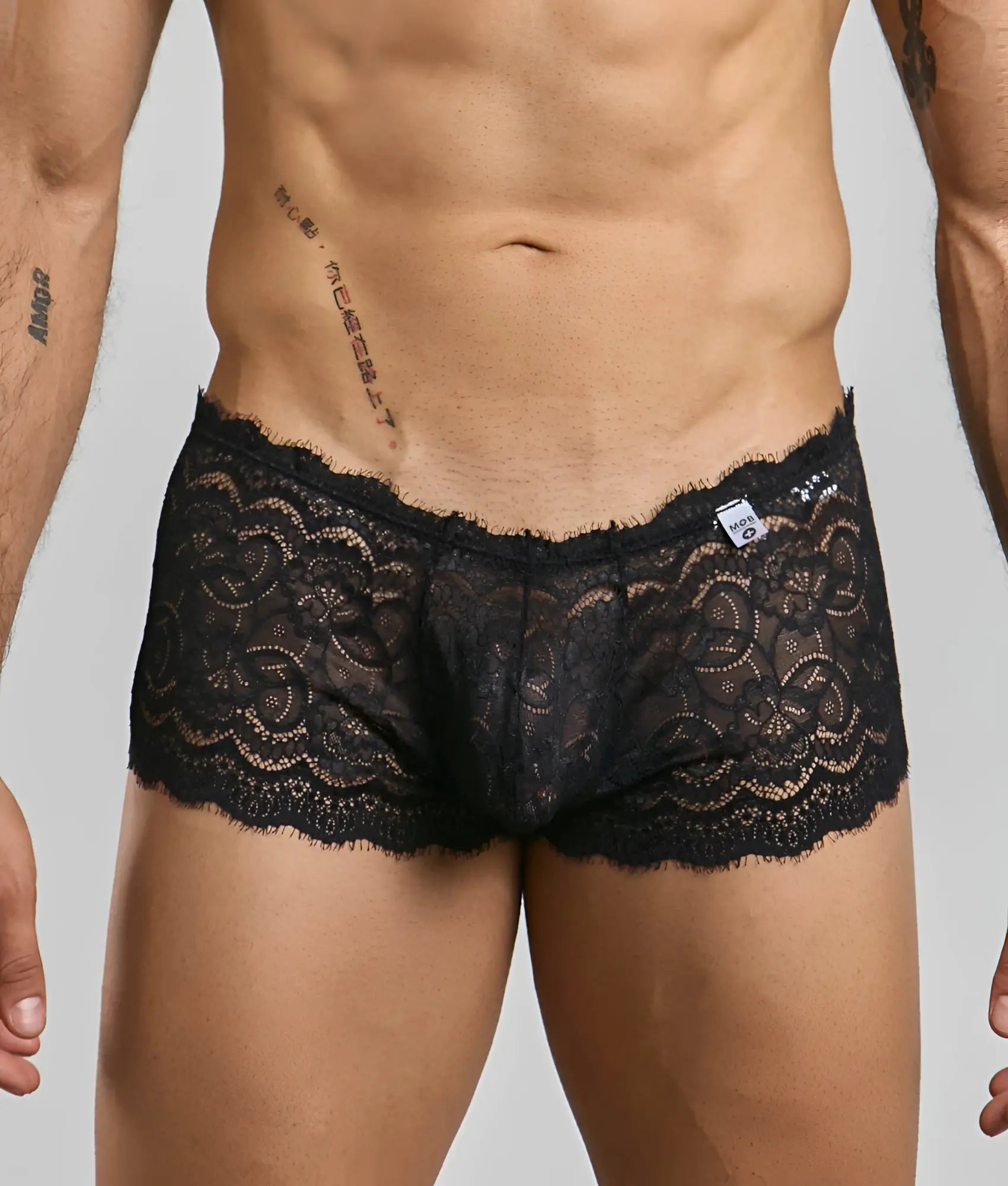 Black lace boxer shorts with intricate floral patterns and delicate frayed hem for men lace boxer short rose