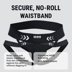 Men’s x jockstrap with black elastic waistband featuring white arrow graphics and mob eroticwear branding visible on back