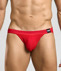 Red textured swim jockstrap briefs with black mob brand tag on the waistband designed for swimming and activewear