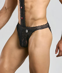 Black lace men’s thong underwear with red buttons and branded tag from mob tuxedo lace collection