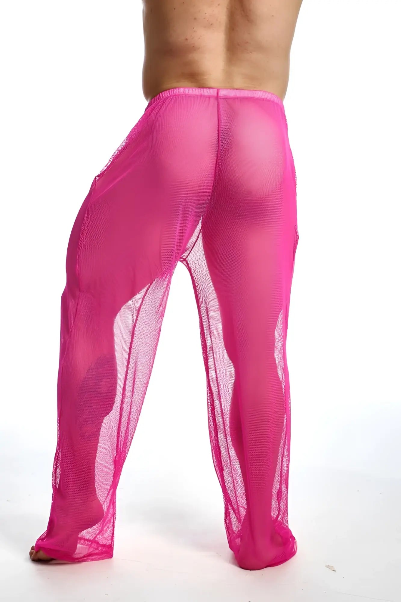 Bright pink mob fishnet pants with sheer mesh fabric and a flowing translucent design for stylish layering