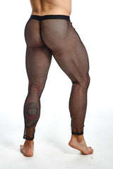 Black mesh leggings with lace floral design on lower leg from mob fishnet tights final sale collection