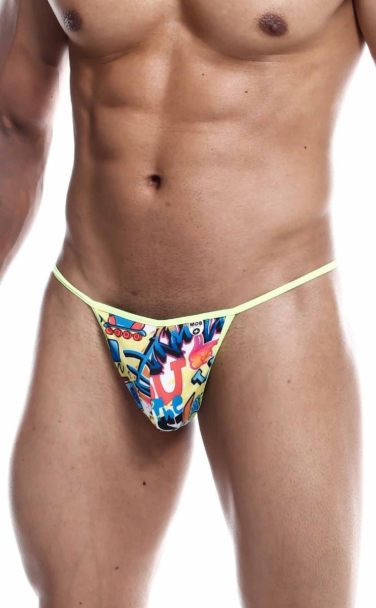 Vibrant yellow MOB hipster t thong with bold graffiti-style print and thin matching elastic waistband front view