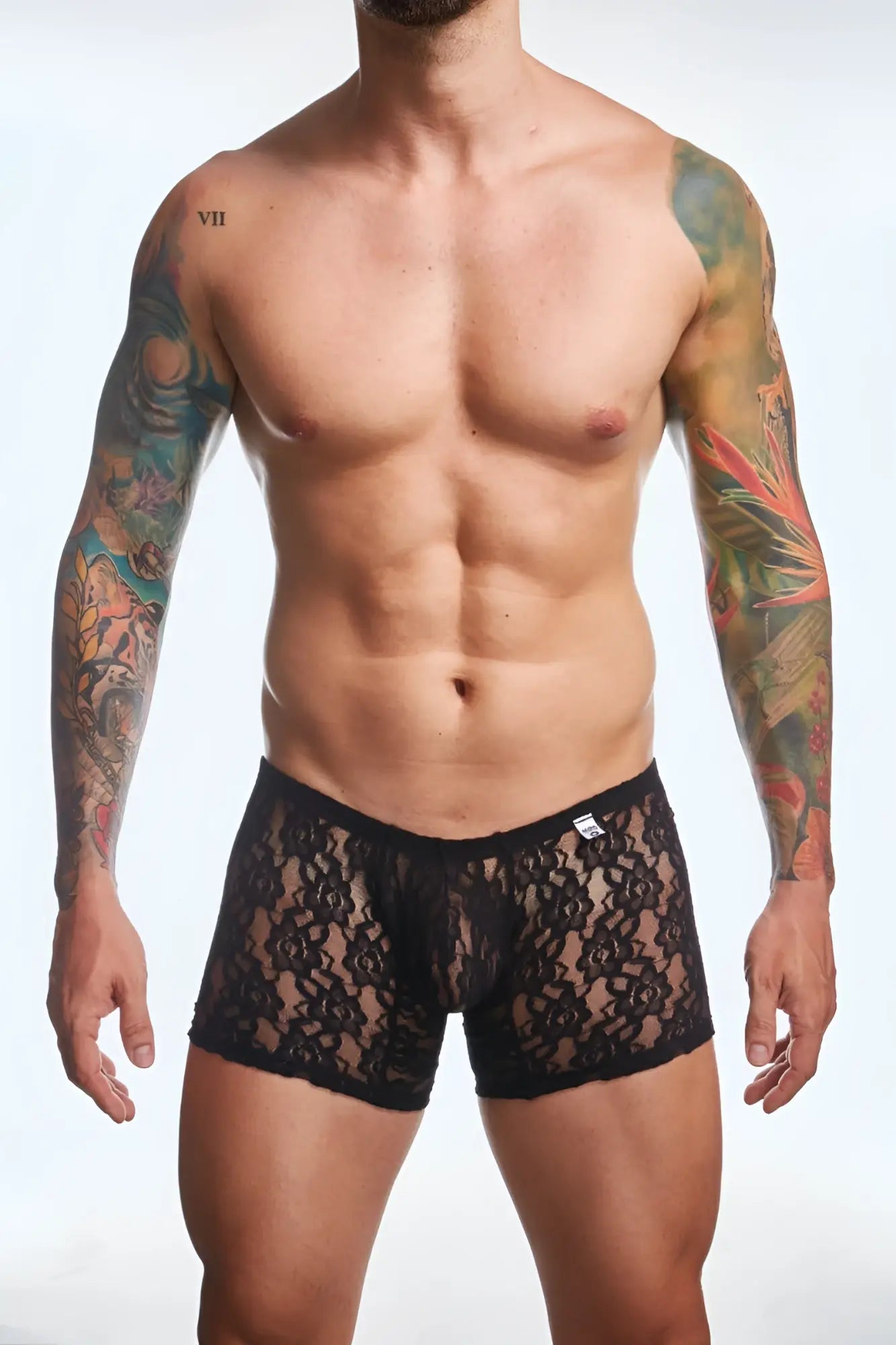 Black lace boxer briefs for men with delicate floral pattern and solid black waistband by MOB