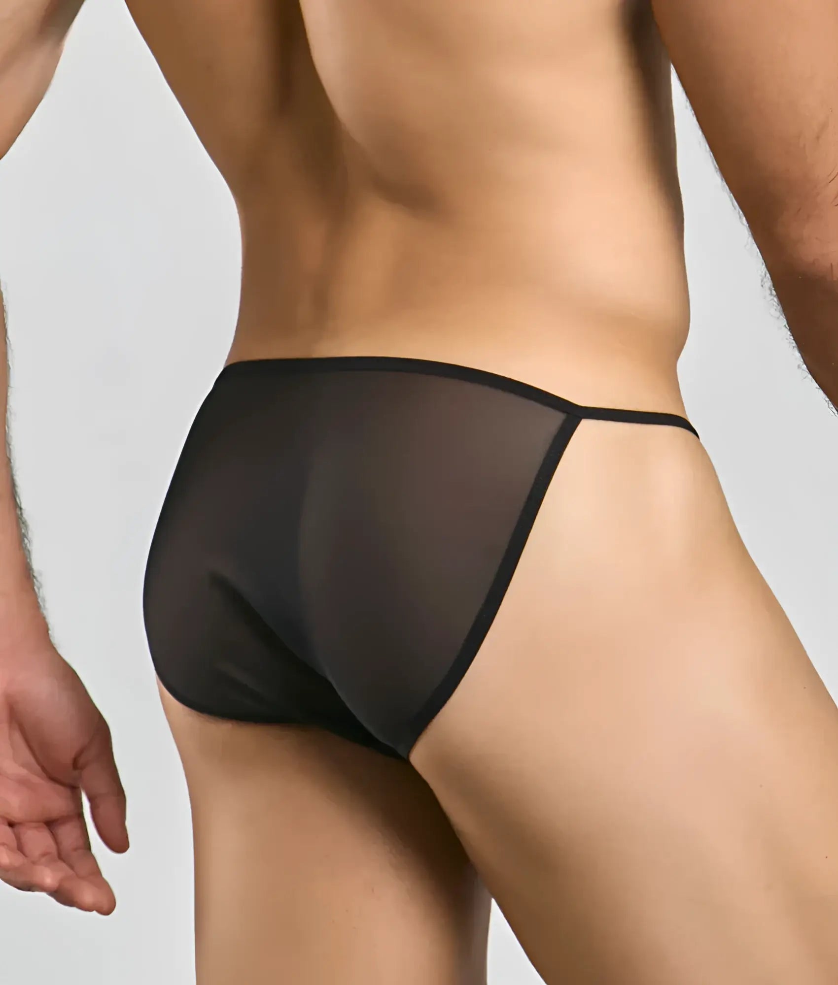 MOB men’s sheer bikini briefs in black sheer mesh with a sleek minimalist design