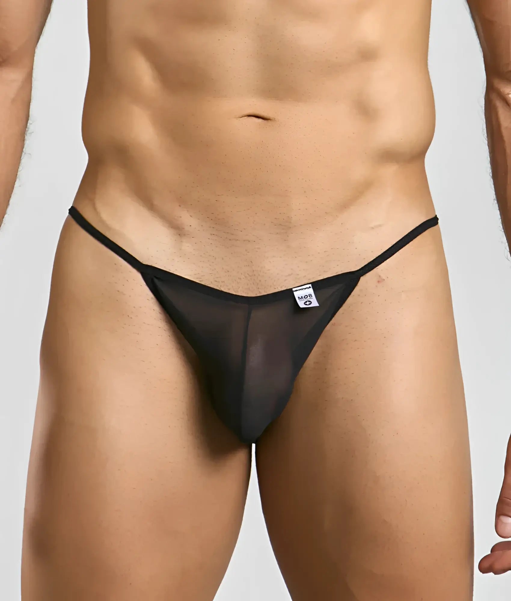 Mob men’s sheer bikini black sheer mesh thong with thin elastic waistband and small white brand tag visible