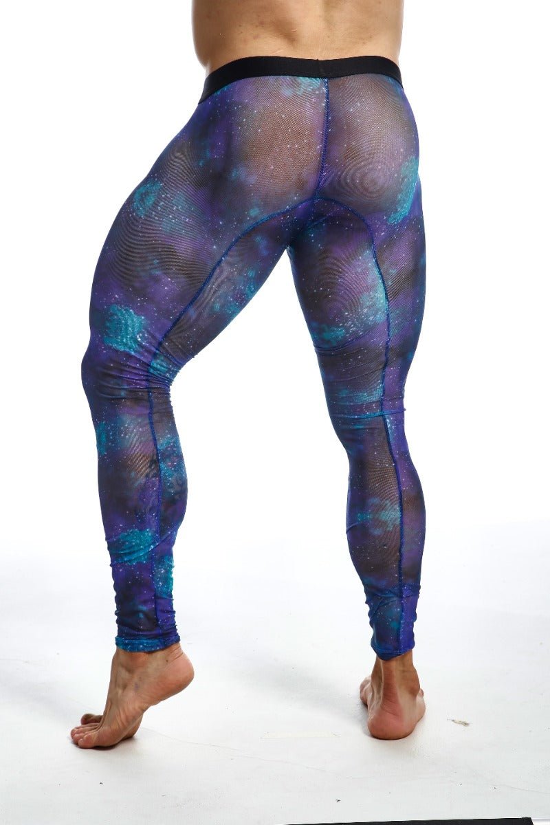 Purple and teal galaxy patterned mesh leggings with black waistband from mob mesh tights shown from the back
