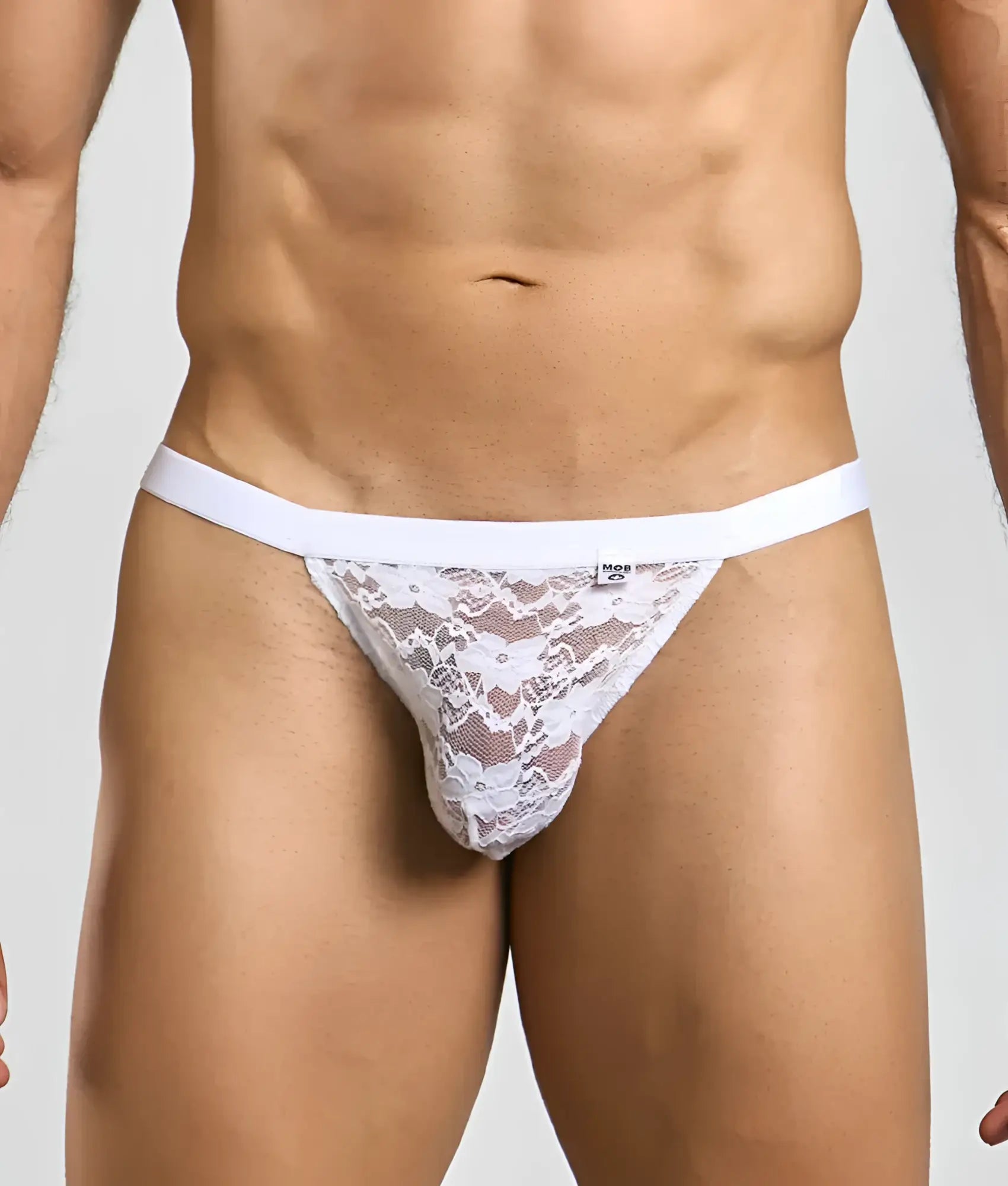 White lace thong with solid white waistband featuring mesh and lace detailing from mob sexy mesh and lace jockstrap
