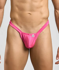 Bright pink sleek form-fitting thong made from smooth stretch fabric with small white mob y buns brand tag at center