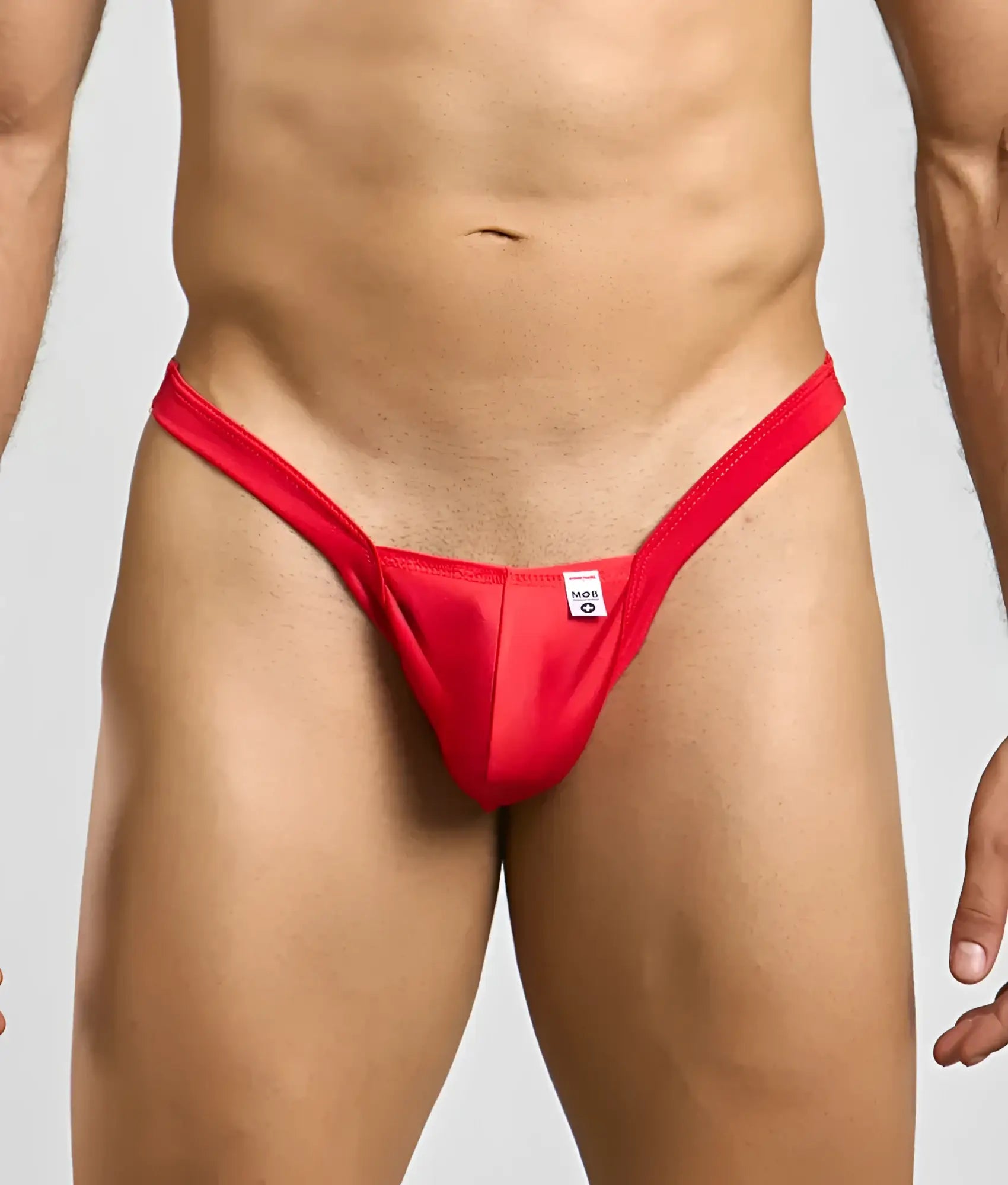 Red thong mob y buns thong with a small white tag at the center front made of soft fabric for comfortable wear