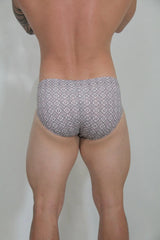 Gray and white geometric patterned mosaic swim brief designed for comfortable and stylish swimwear use