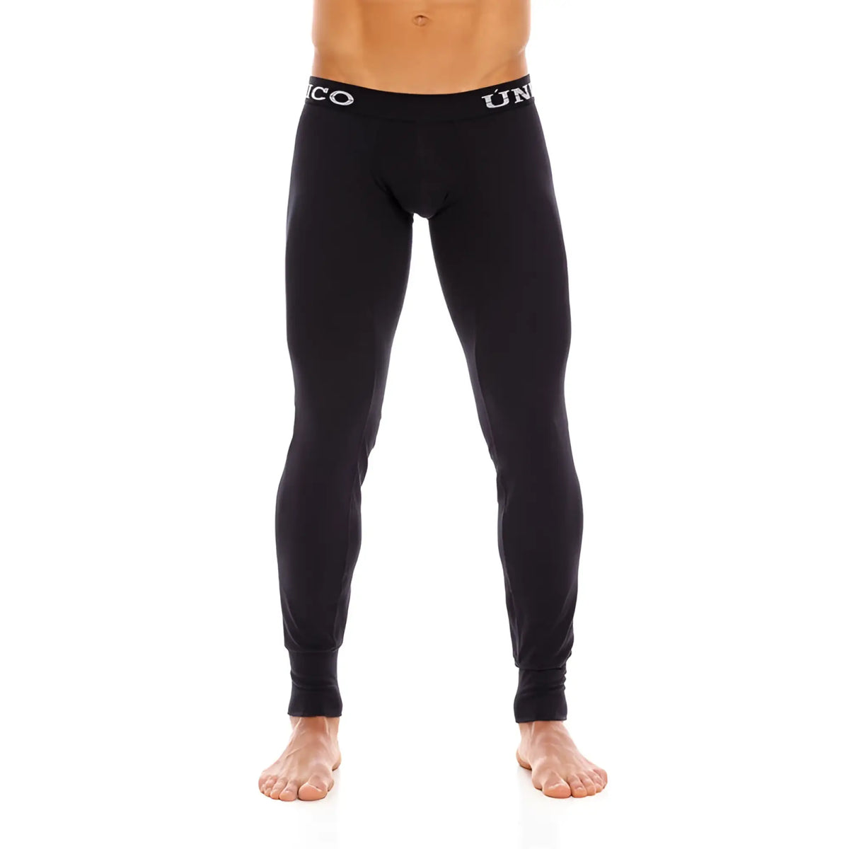 Black uniqlo compression tights with snug fit and white logo trim at waistband from mundo unico cold mountain line