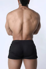 Muzzle up athletic short black sleek form-fitting design ideal for sports and active wear in breathable fabric