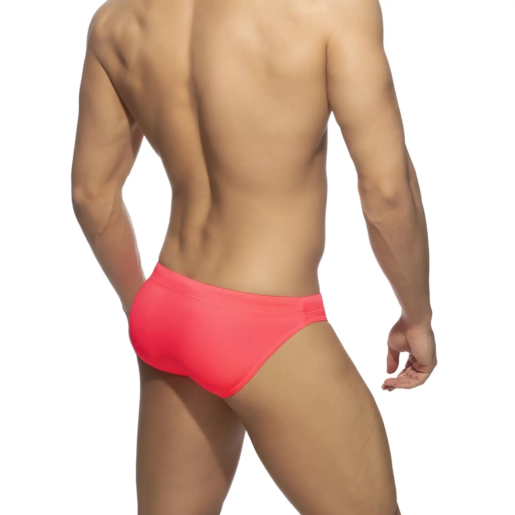 Neon swim bikini bright coral-colored swim trunks with sleek form-fitting design ideal for beachwear