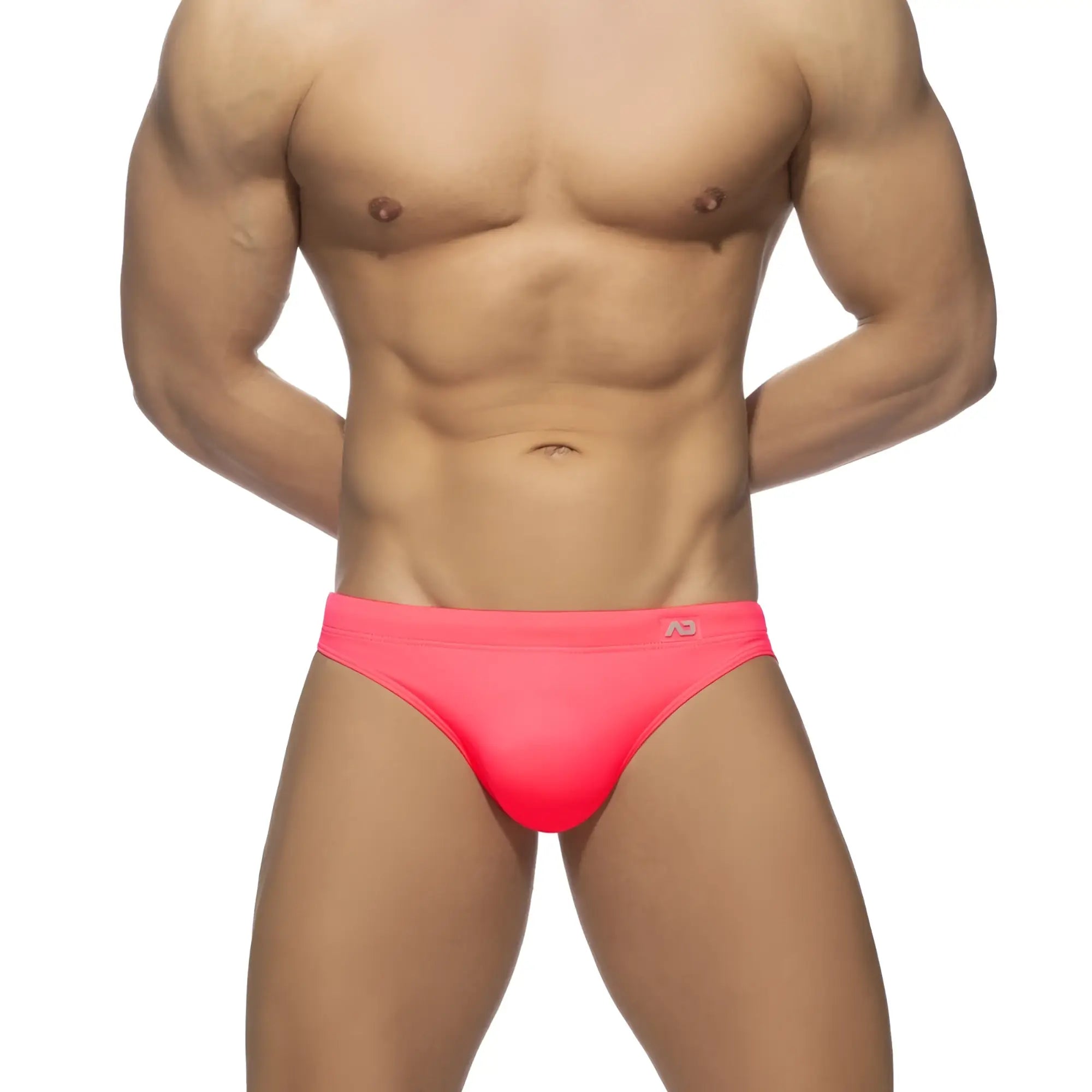 Bright pink neon swim bikini trunks with a snug fit and small waistband logo perfect for swimming