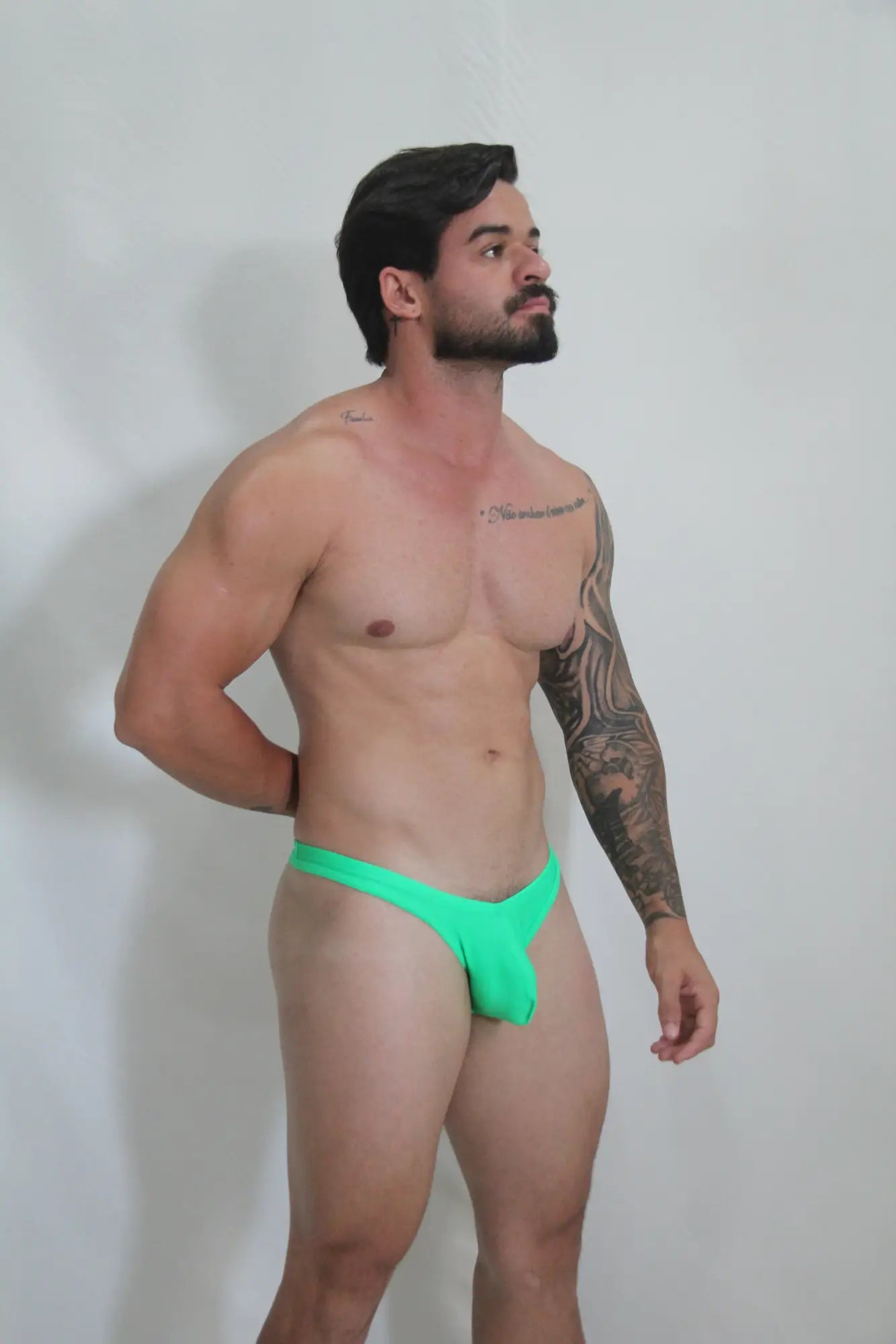 Neon swim thong vibrant neon green briefs with a snug form-fitting design available in four colors