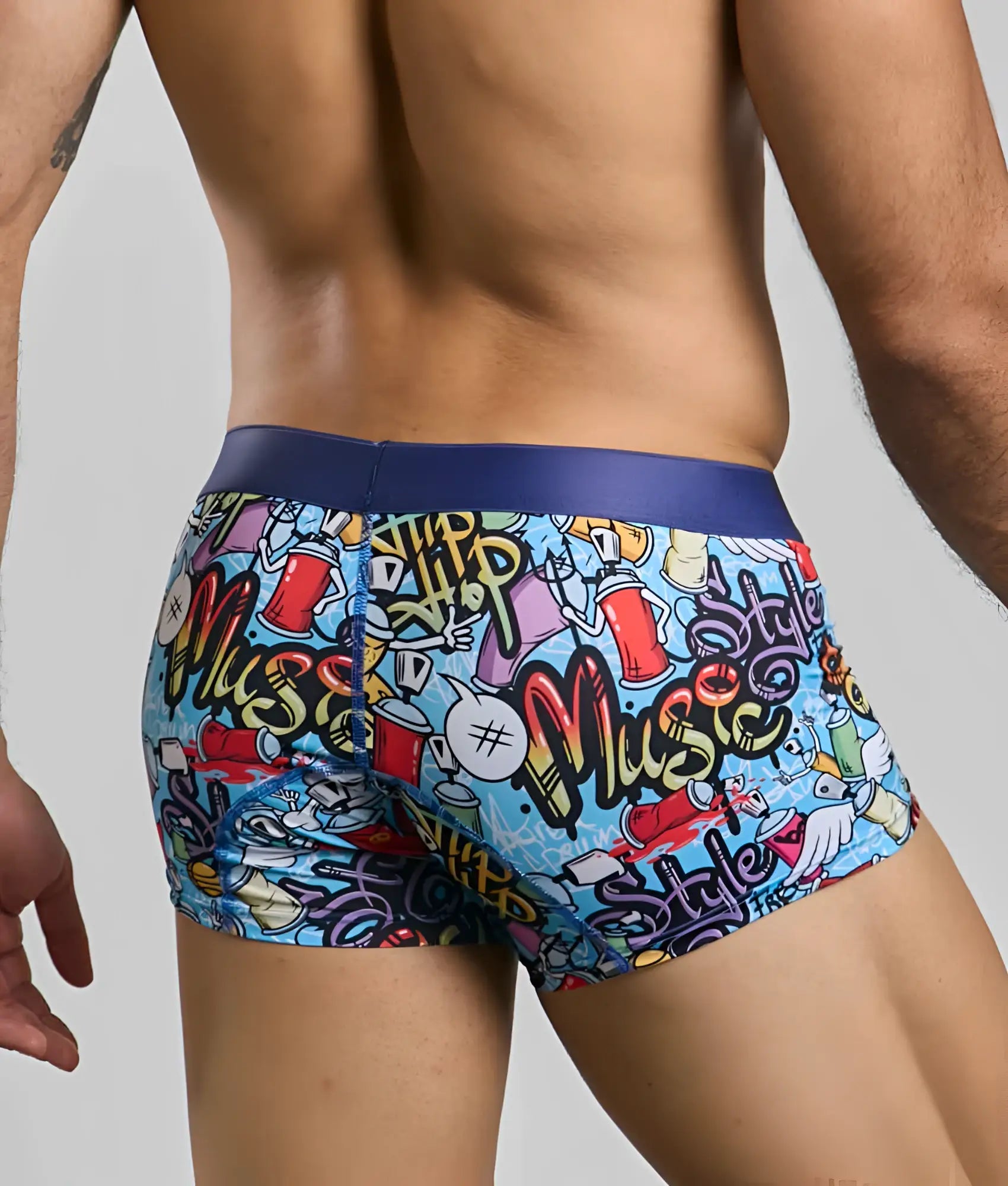 New malebasics trunk hipster boxer briefs in blue with vibrant graffiti print featuring spray cans drums and music text
