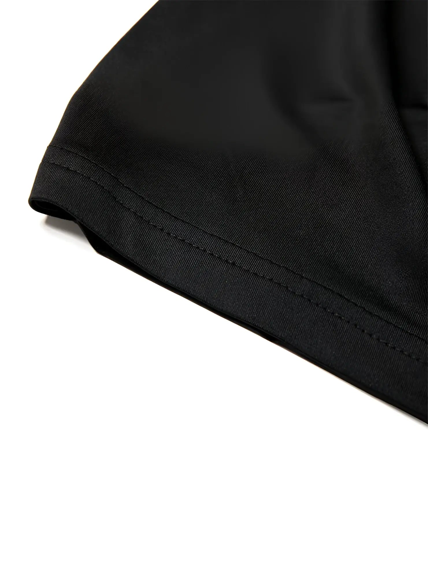 Black cotton t-shirt with neatly stitched hem paired with nylon active underwear boxer shorts product display