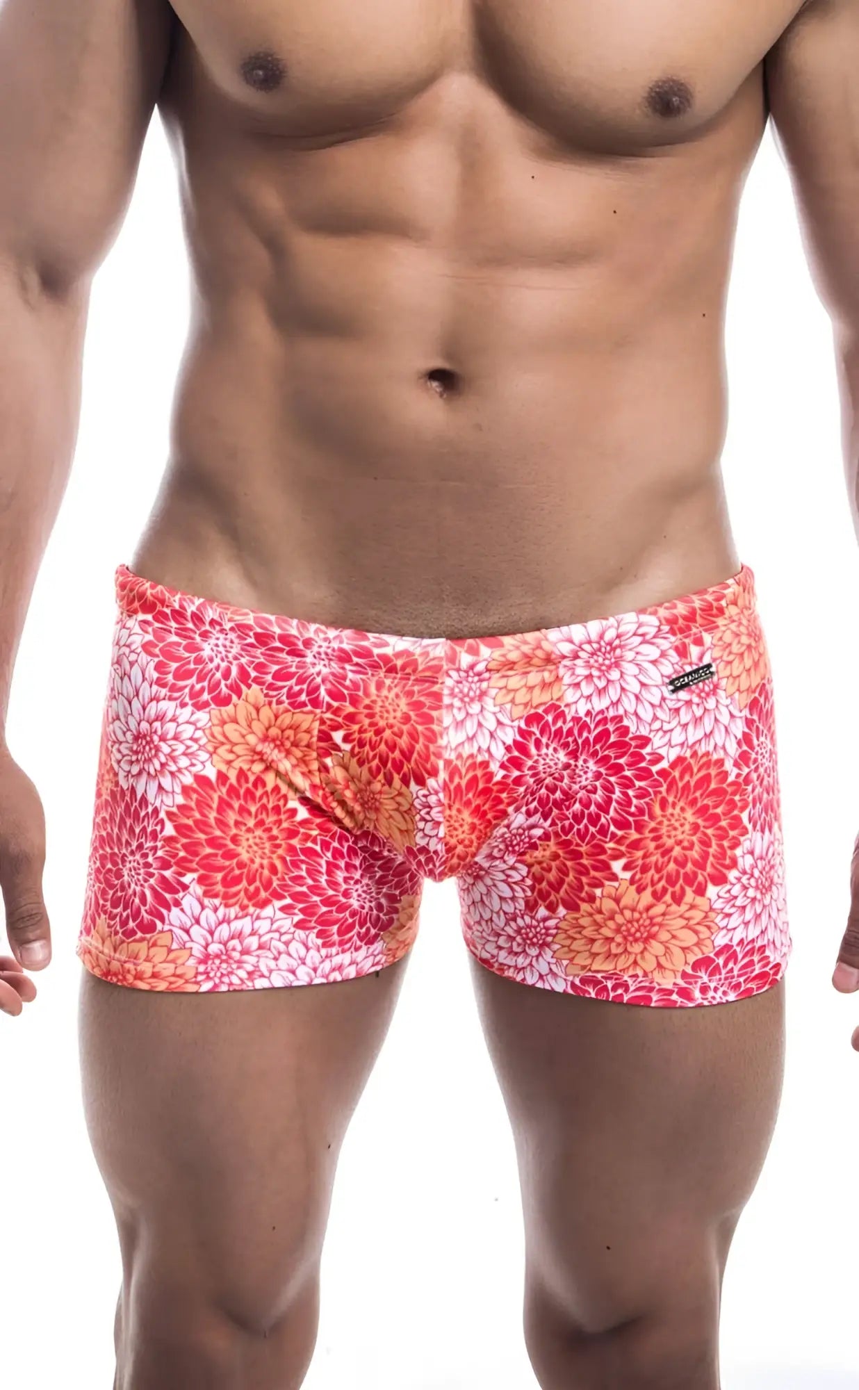 Oceanico square cut swim trunks with vibrant pink red and orange floral pattern ideal for beachwear