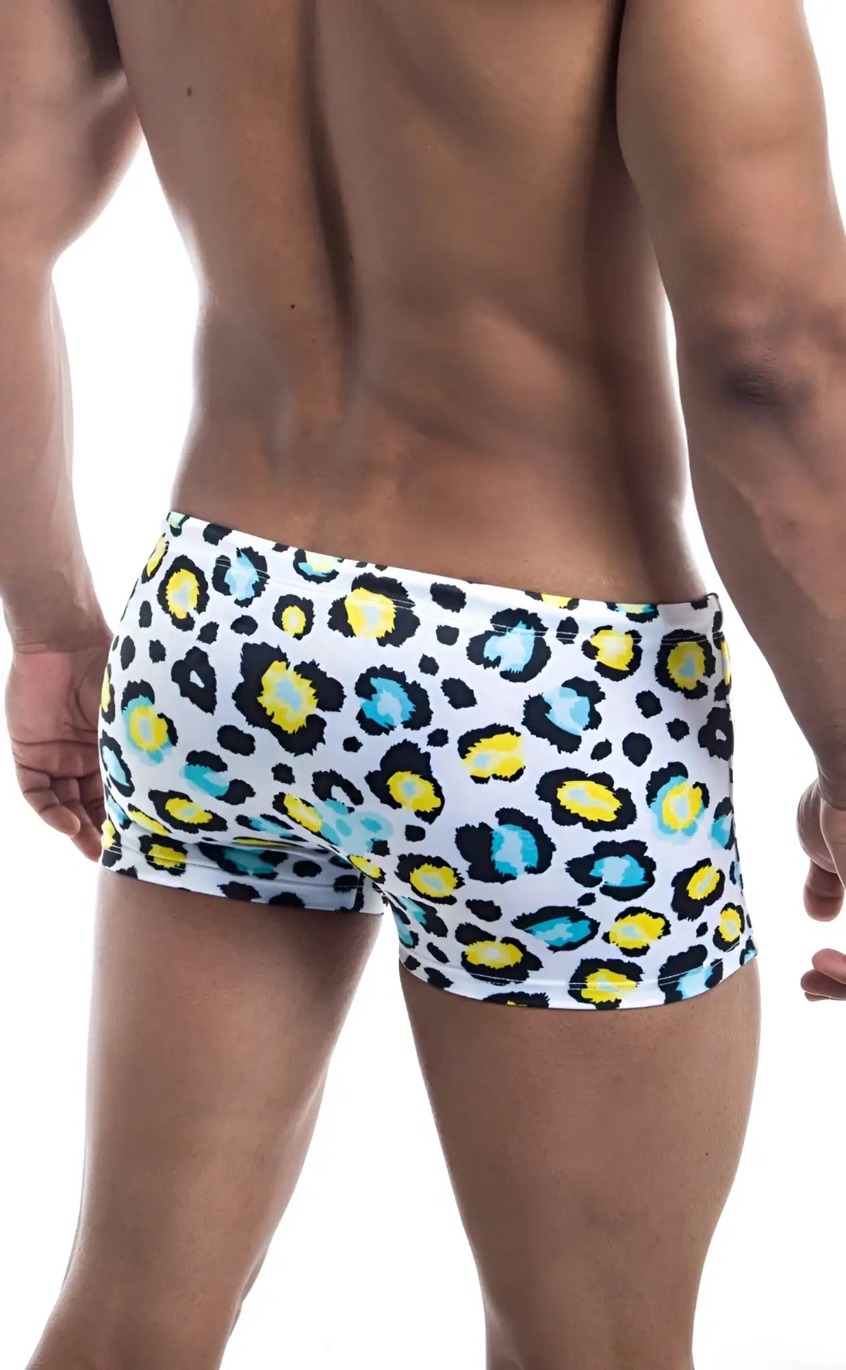 Oceanico square cut white swim trunks with bold leopard print in yellow and teal spots for beachwear