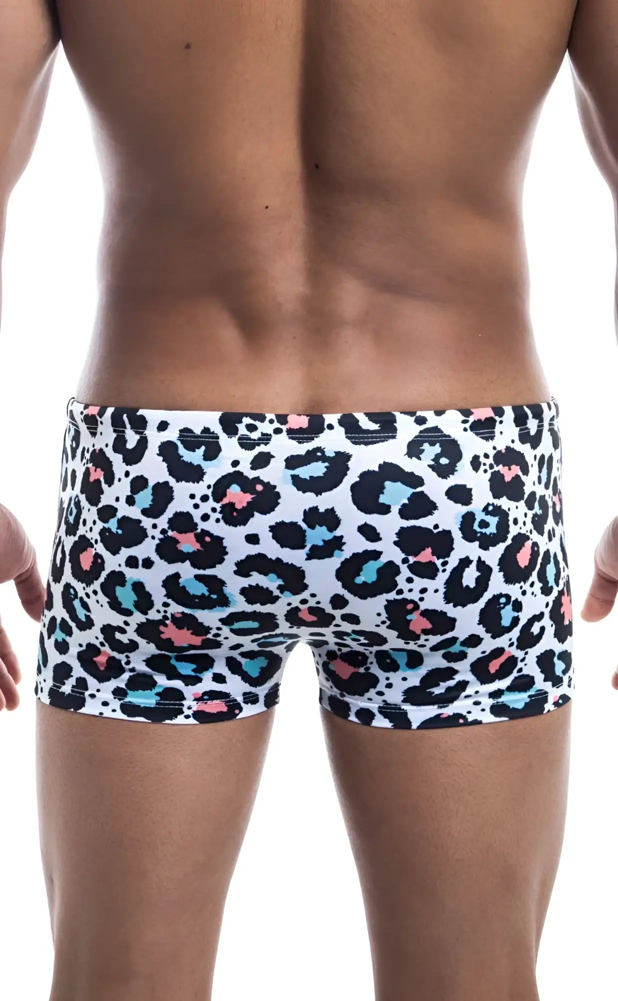 Oceanico square cut white swim trunks with bold leopard print featuring black teal and pink spots