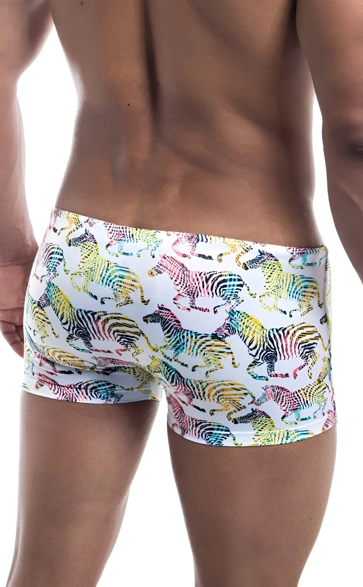 White oceanico square cut swim trunks with vibrant rainbow zebra pattern perfect for beachwear