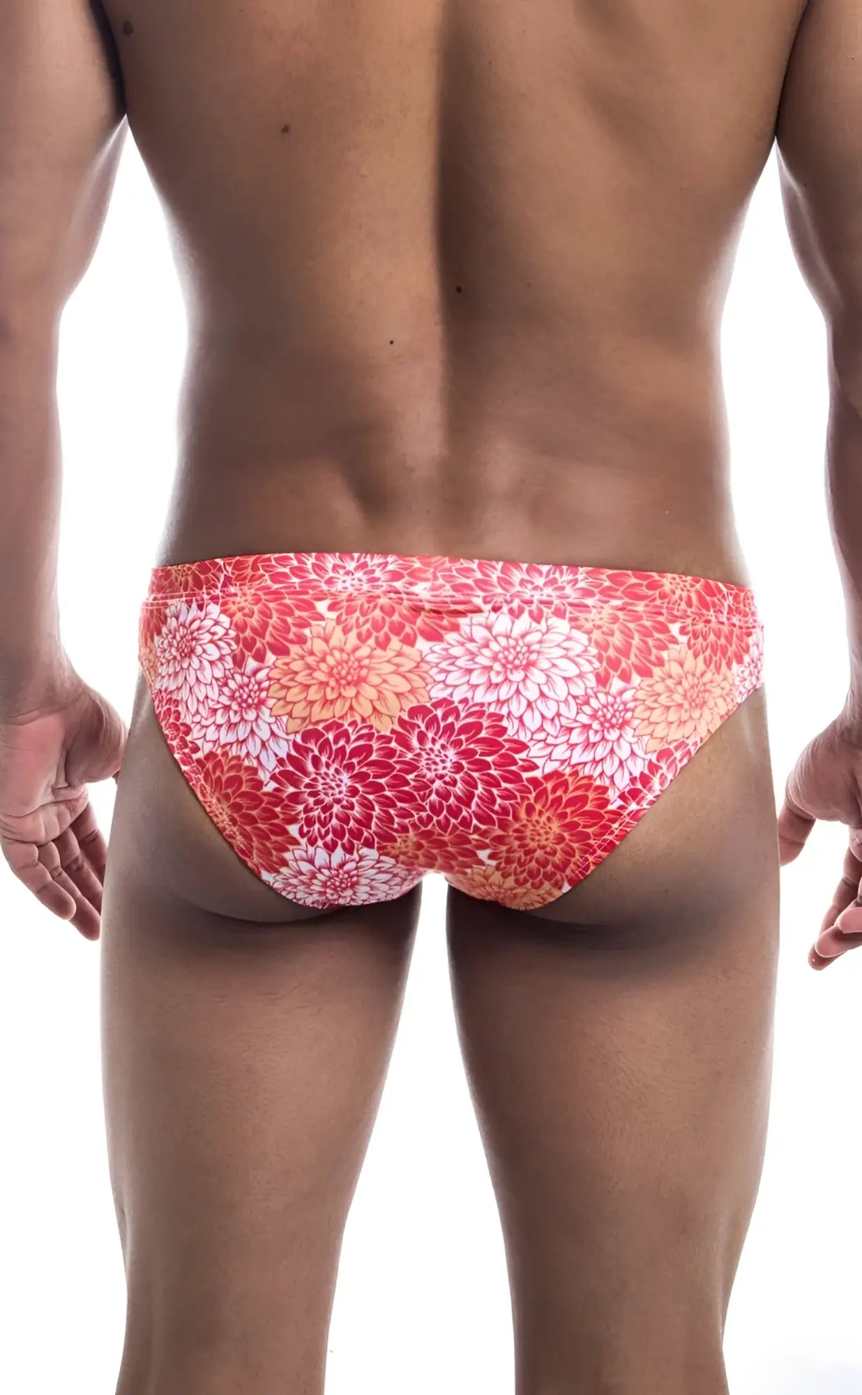 Vibrant coral and white floral-patterned oceanico swim bikini trunks perfect for beach and pool wear