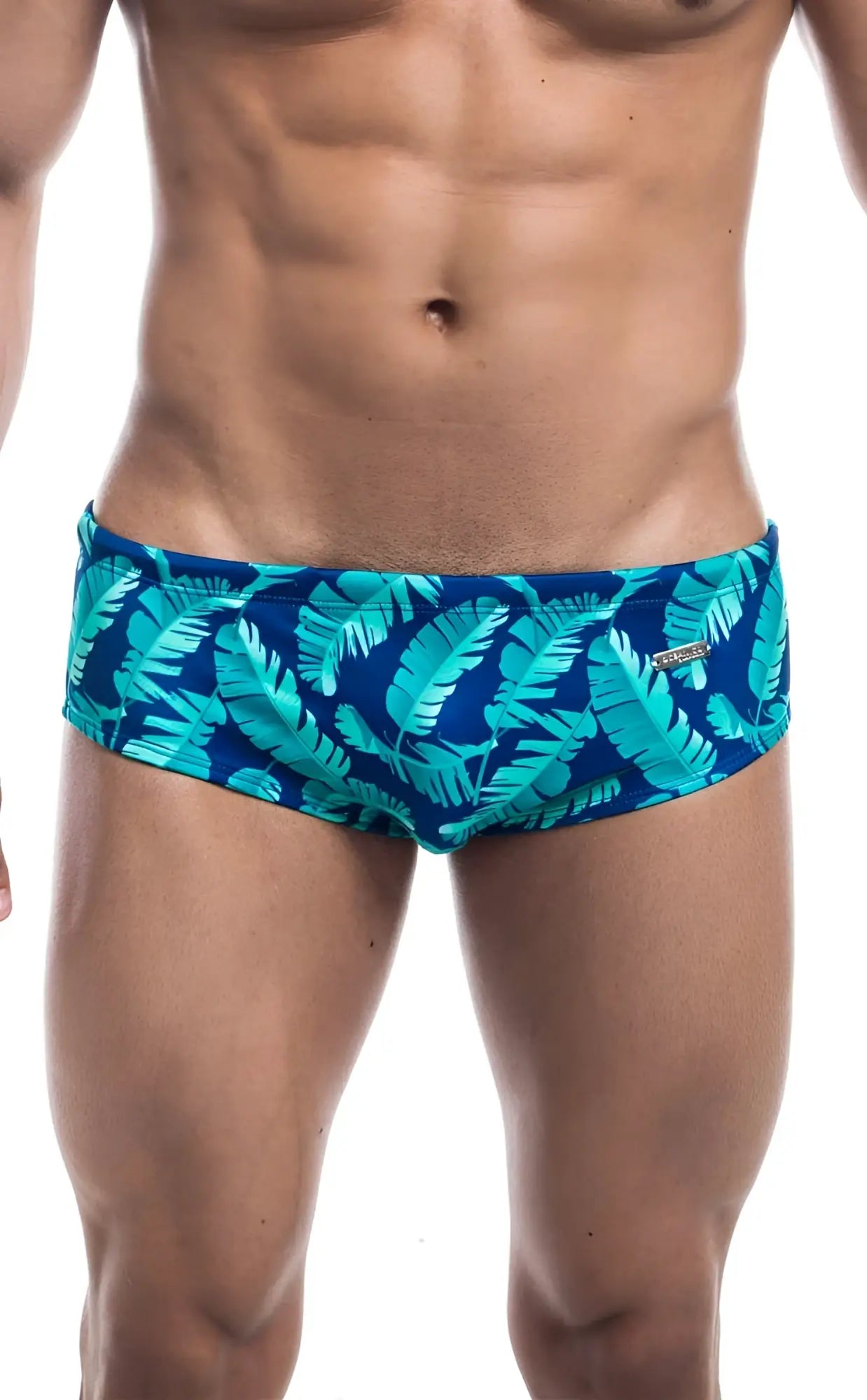Oceanico swim brief in blue with vibrant turquoise tropical leaf pattern designed for swimming and beachwear