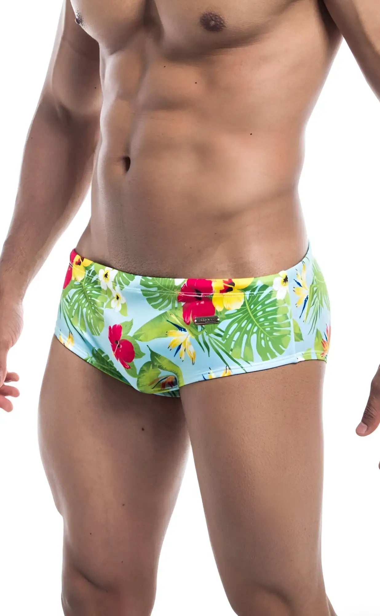 Oceanico swim brief featuring brightly colored tropical print in light blue green red and yellow for beachwear