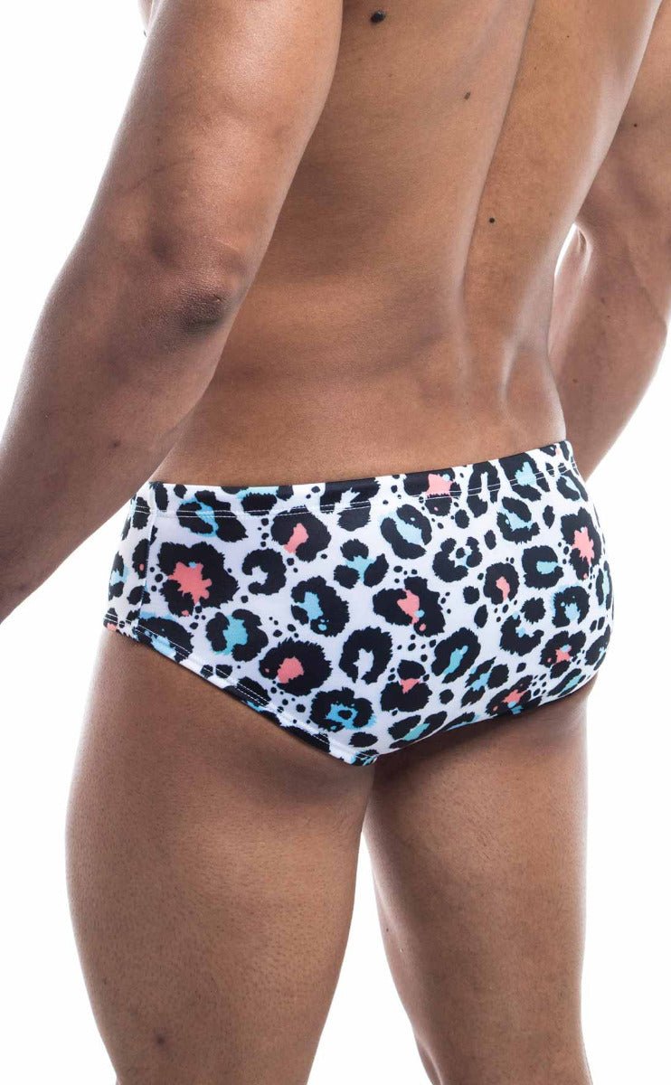 Oceanico swim brief white swim trunks with bold leopard print black spots accented by pink and light blue