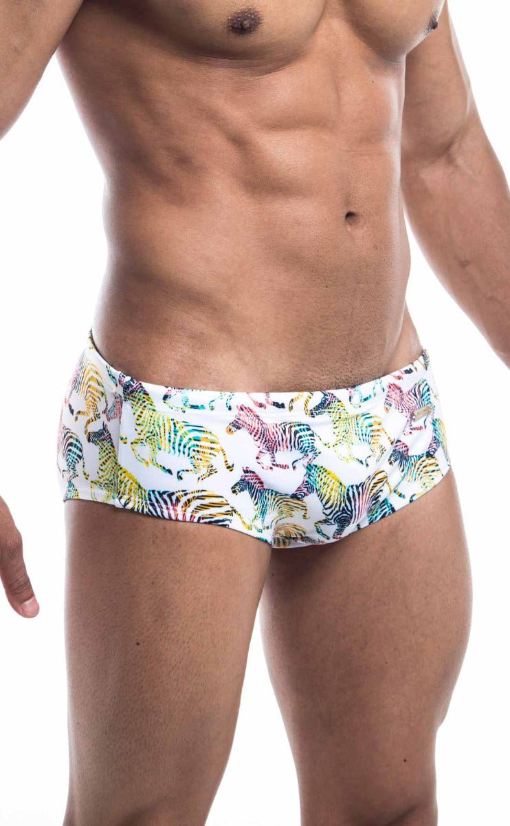 Oceanico swim brief white swim trunks with vibrant multicolored zebra print pattern for beachwear